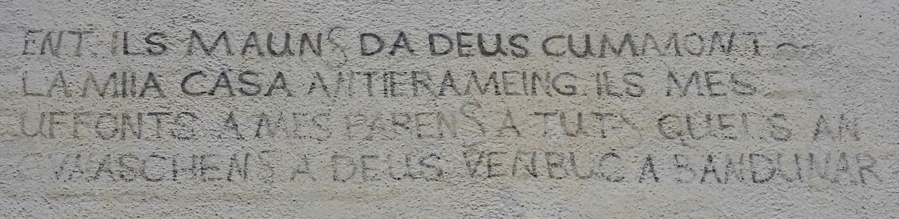 Pignia: Inschrift an Haus